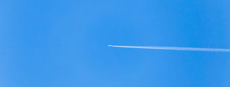 trace of the plane in the skyの写真素材