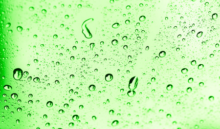 water drops on green glassの写真素材