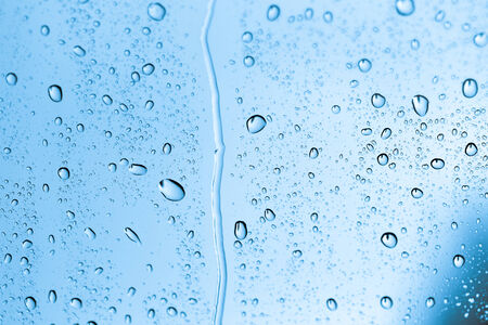 water drops on blue glass