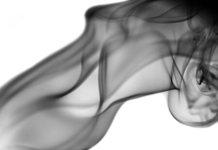 Black smoke on a white backgroundの写真素材