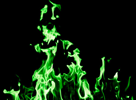 green flame fire on black backgroundの写真素材
