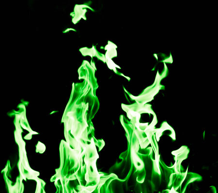 green flame fire on black backgroundの写真素材