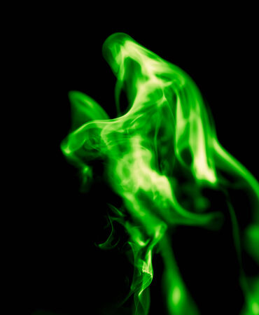 green smoke on black backgroundの写真素材
