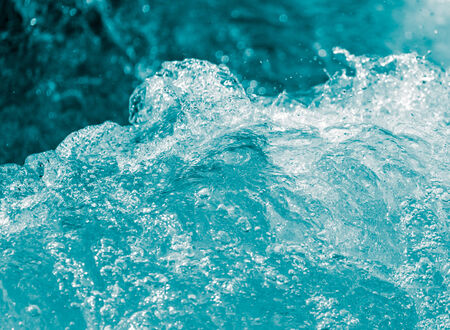 background of stormy water with splashes