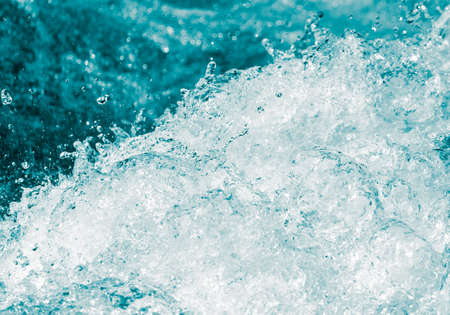 background of stormy water with splashes