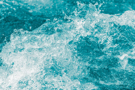 background of stormy water with splashes