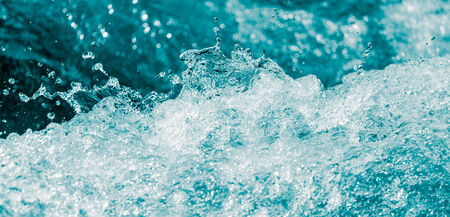 background of stormy water with splashesの写真素材