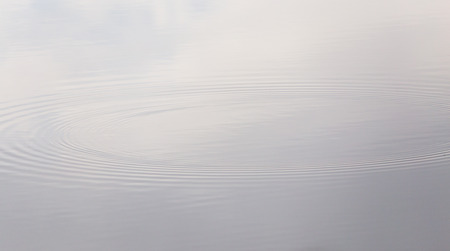 Sunset reflection in waterの写真素材