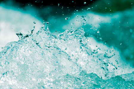 abstract background. water wave with splashesの写真素材