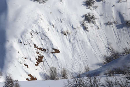snowy slopes in the mountains