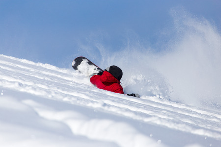 snowboarder falls to rateの写真素材