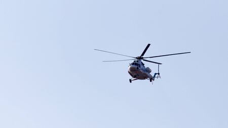 helicopter on a blue sky