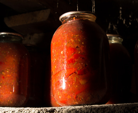 old bank with a tomato in the basement in the darkの写真素材