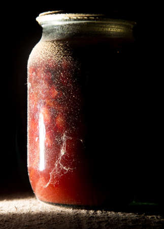 old bank with jam in the basement in the darkの写真素材