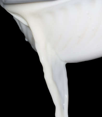 milk on a black backgroundの写真素材