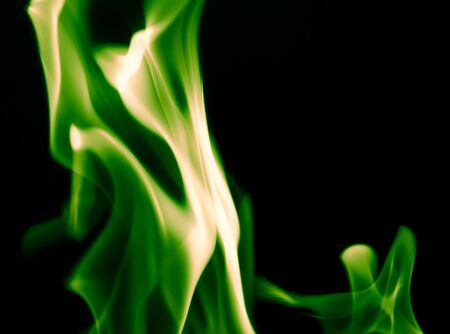green flame fire on a black backgroundの写真素材