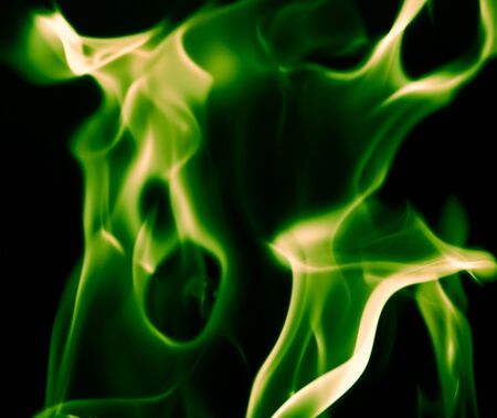 green flame fire on a black backgroundの写真素材