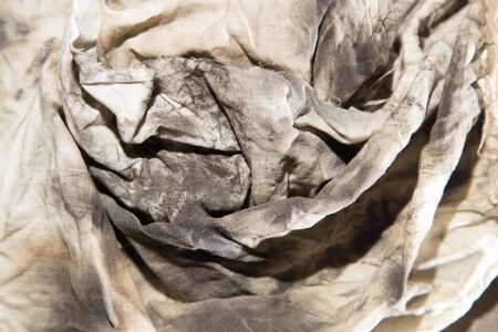 dirty rags in oil as backgroundの写真素材
