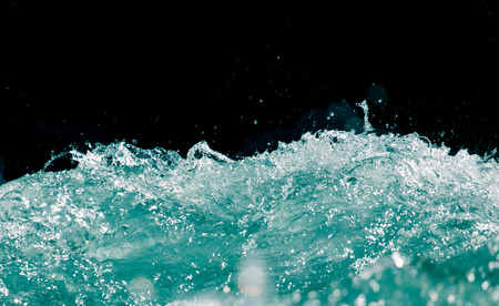 sea wave on a black backgroundの写真素材