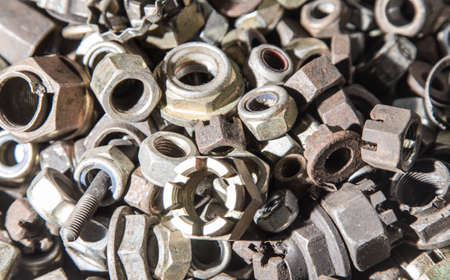 Detail of different metallic bolts and nutsの写真素材