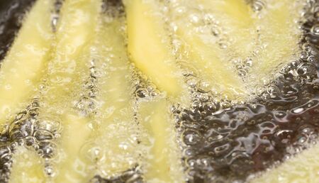 French fries fried in a pan
