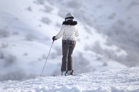 Woman on the slope.Skiing.の写真素材