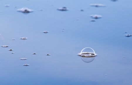 Air bubbles on the surface of the waterの写真素材