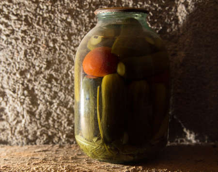 old bank with cucumbers in the basement in the darkの写真素材