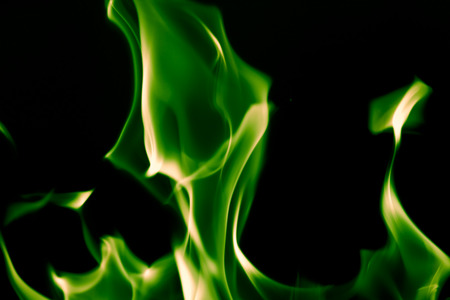 green flame fire on a black backgroundの写真素材