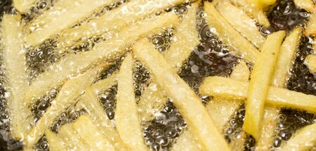 French fries fried in a pan