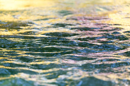 Abstract colored surface of the waterの写真素材