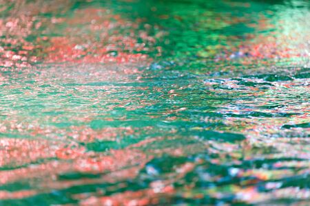 Abstract colored surface of the waterの写真素材