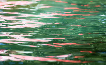 Abstract colored surface of the waterの写真素材
