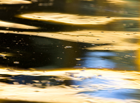 colored surface of the water as a background