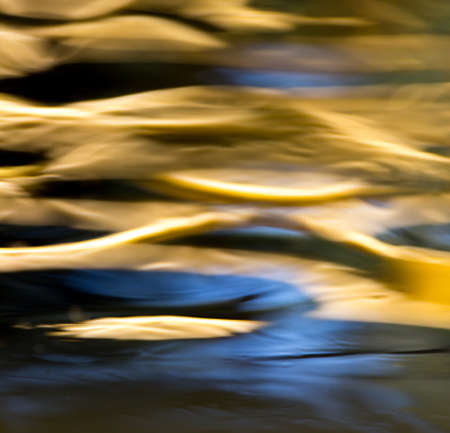 colored surface of the water as a backgroundの写真素材