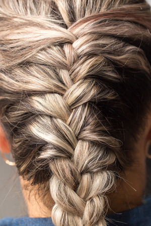 Braided pigtails in the beauty salonの写真素材