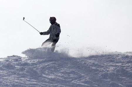 man snowboarding in the snowの写真素材