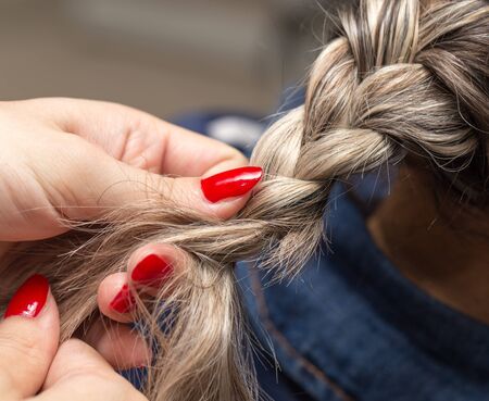 Braided pigtails in the beauty salon