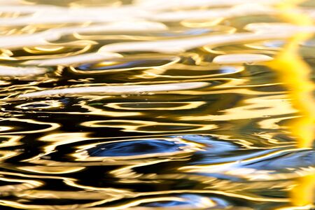 colored surface of the water as a backgroundの写真素材