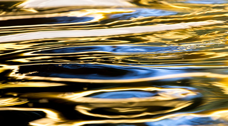 colored surface of the water as a backgroundの写真素材