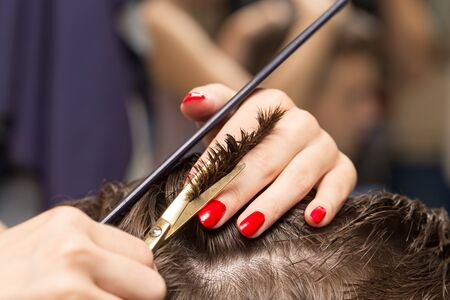 men's hair cutting scissors in a beauty salonの写真素材