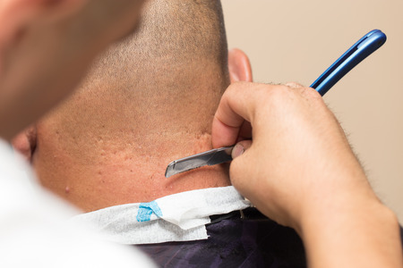 razor haircut at the beauty salonの写真素材