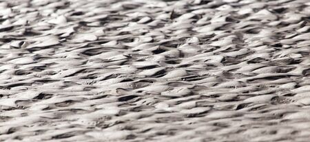 background of sand on the shoreの写真素材