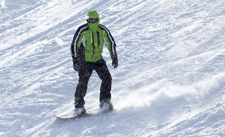man snowboarding in the winterの写真素材