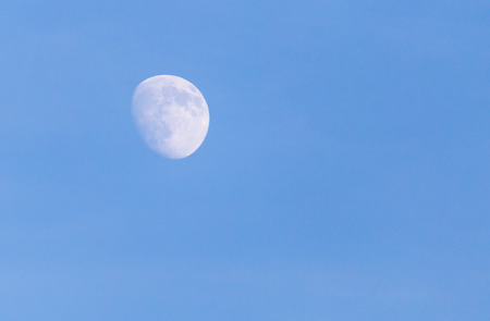 moon in the blue skyの写真素材