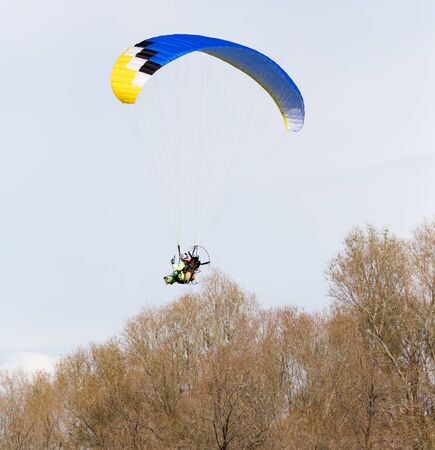 parachute flying in the sky
