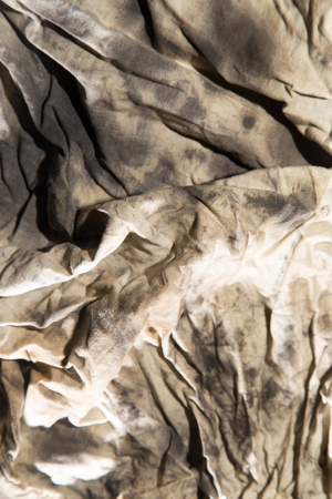 dirty rags in oil as backgroundの写真素材