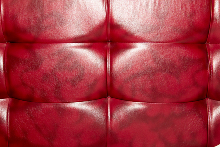 Buttoned on the red Texture. Repeat patternの写真素材