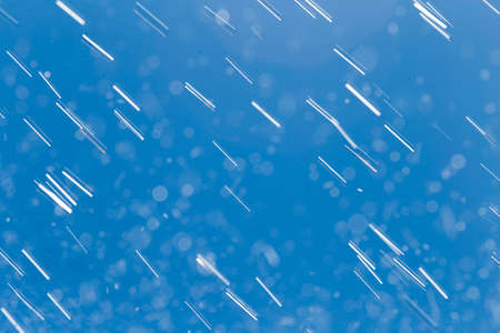 rain drops on a background of blue sky