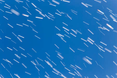 rain drops on a background of blue sky